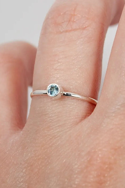 Dainty Blue Topaz Solitaire Sterling Silver Ring